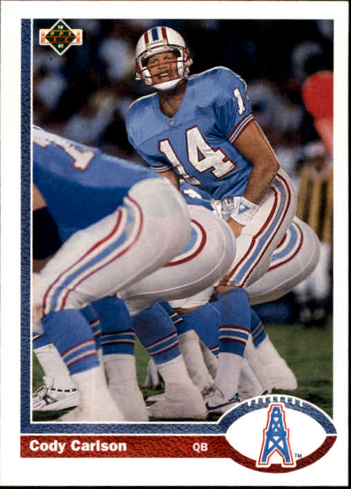 Cody Carlson of the Houston Oilers rolls out to pass against the News  Photo - Getty Images